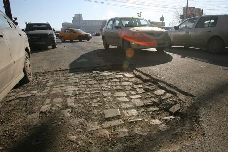 Poliţiştii "vânează" gropile din asfalt