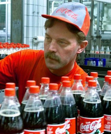 China a blocat o tranzacţie a companiei Coca-Cola