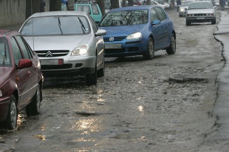 În instanţă, pentru gropile din asfalt