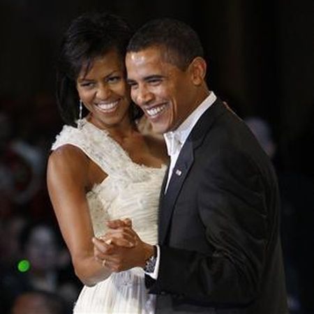 Barack şi Michelle Obama, profit de milioane de dolari