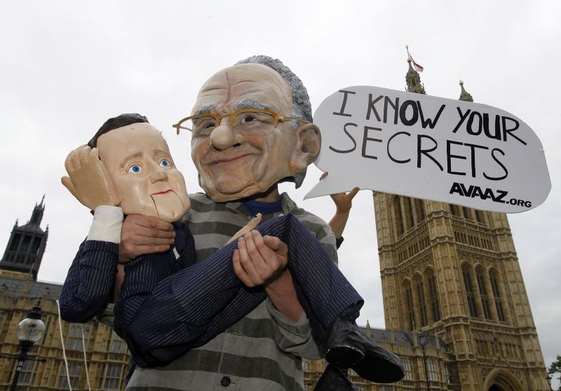 Cameron, prins în firele scandalului interceptărilor