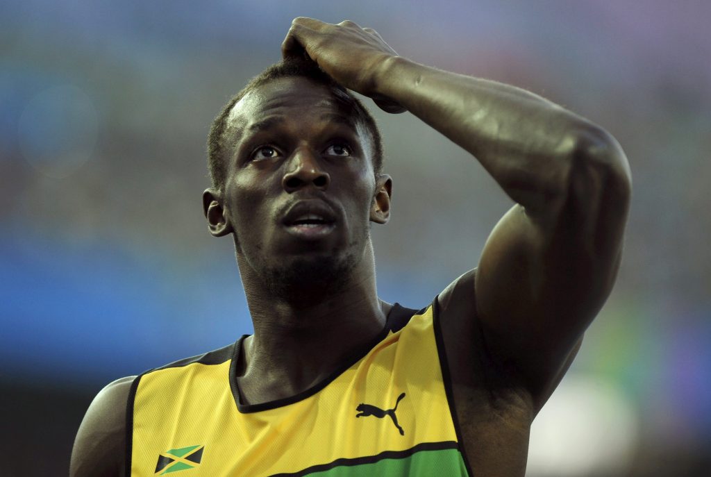 CM atletism: Bolt a "furat" startul la sută şi a fost descalificat! Blake, noul campion mondial