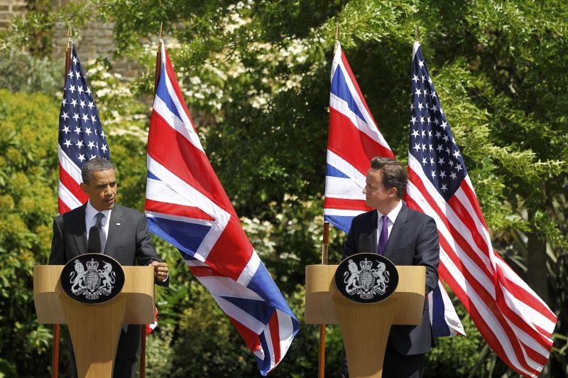 Obama şi Cameron îi cer lui Muammar Gaddafi să renunţe la putere