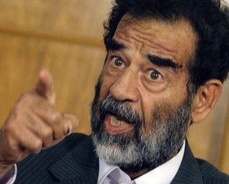 Saddam Hussein a prezis că economia SUA va avea probleme