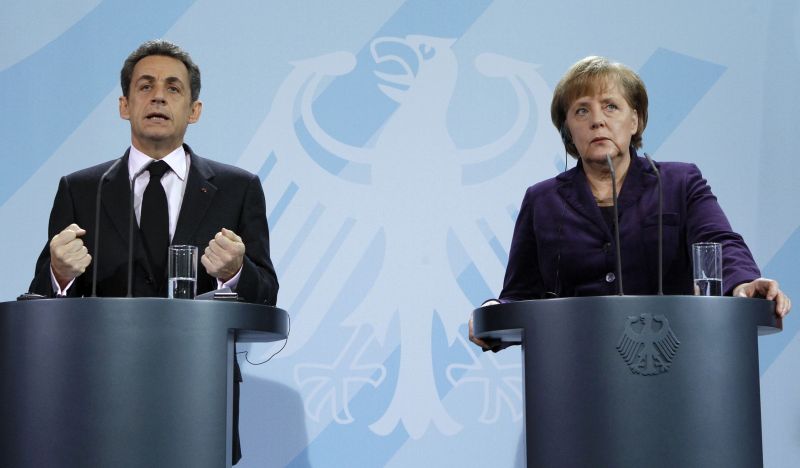 Merkel și Sarkozy construiesc un nou Turn Babel. De data aceasta este făcut din bani