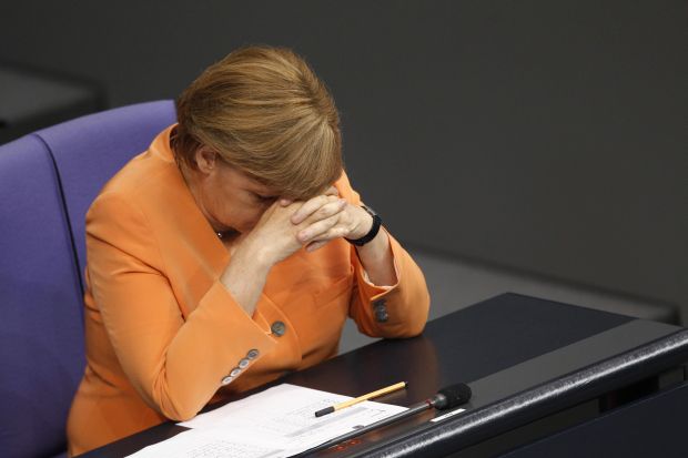 Merkel, primul test pentru Hollande