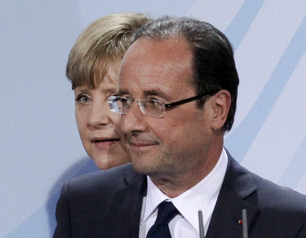 Prima întâlnire Merkel-Hollande: ”Vrem ca Grecia să rămână în zona euro”