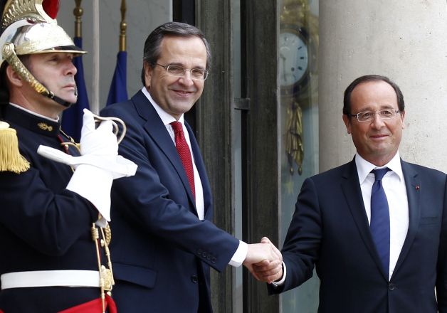 Parisul şi Berlinul nu văd Grecia în afara zonei euro
