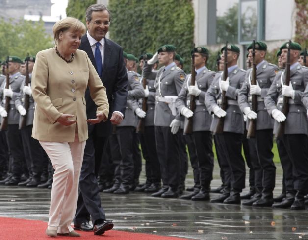 Angela Merkel merge la Atena, prima sa vizită în Grecia de la debutul euro-crizei
