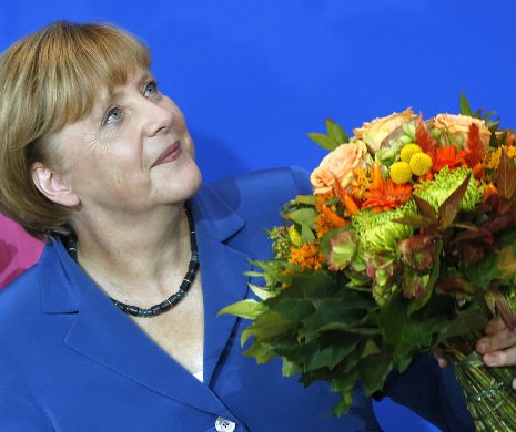 Flori şi şampanie pentru Angela Merkel la împlinirea vârstei de 60 de ani