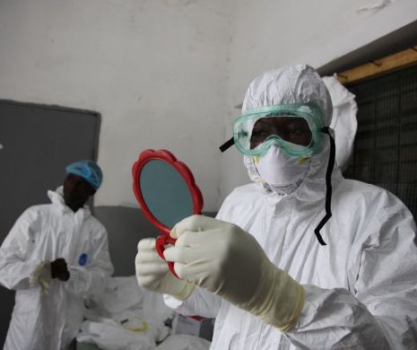 Reportaj în infernul Ebola: nu există doctori, personalul medical moare sau fuge pe capete, cadavrele putrezesc în curte!