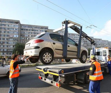 Instanţă: Maşinile parcate neregulamentar sunt ridicate pe baza unei hotărâri ilegale a Consiliului Local