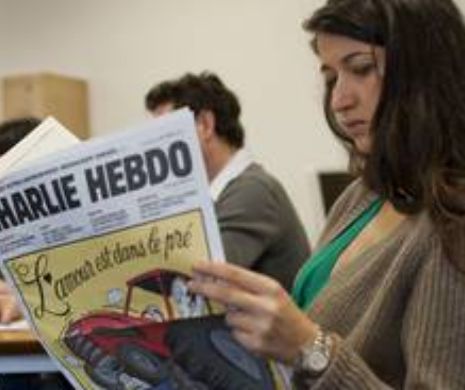Teroriștii nu se potolesc.O colaboratoare de la Charlie Hebdo amenințată cu moartea pe Twiter