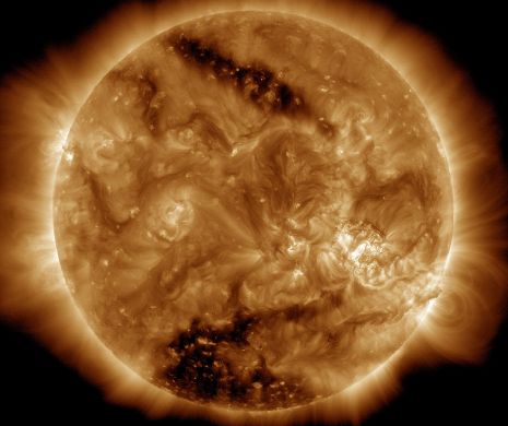 Se apropie APOCALIPSA? Oamenii de știință de la NASA au descoperit două GĂURI ÎNTUNECATE care cuprind 10% din suprafața Soarelui