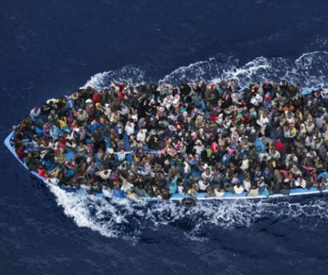 În pragul COLAPSULUI.  Imigranţii ilegali ajunşi în Italia se adăpostesc prin GĂRI, pentru că centrele de primire a refugiaţilor sunt pline