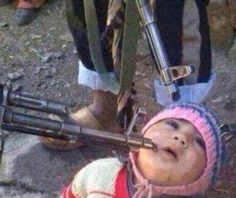 Bebeluș ARUNCAT în AER de ISIS într-o tabără de antrenament a teroriștilor-STAGIARI!