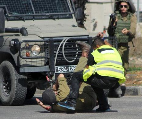 Înfruntare teribilă între un “jurnalist” MĂCELAR şi un militar israelian. Scene de coşmar în apropiere de Hebron.