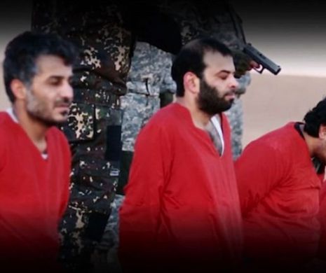 Un nou videoclip ÎNFIORĂTOR al ISIS şi un nou John Jihadistul care răspândeşte TEROARE. Cinci „SPIONI” britanici sunt executaţi fără milă sub privirile unui copil care AMENINŢĂ Marea Britanie