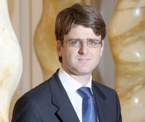Fiul milionarului Adamescu, arestat la o conferinţă despre „abuzurile autorităţilor române”