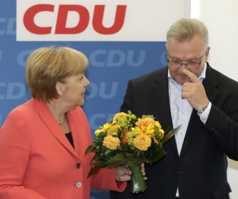 Merkel își asumă vina pentru eșecul în alegeri