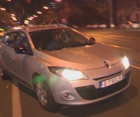 Scene ireale aseara in Bucuresti. De ce au aruncat cativa taximetristi cu oua in aceasta masina