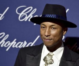 Solistul Pharrell Williams, tată de tripleți