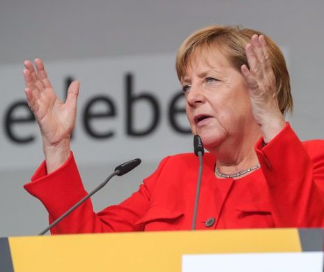 Merkel,  HUIDUITĂ şi FLUIERATĂ  îndelung la Munchen
