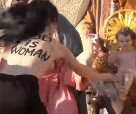O militantă Femen a FURAT Pruncul din ieslea de Crăciun de la Vatican strigând: „Dumnezeu e FEMEIE”