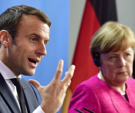 DIHONIE între Merkel și Macron privind VIITOAREA față a UE. Ce facem cum IMIGRANȚII?