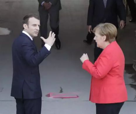 Euro-avânturile lui Merkel și Macron se izbesc de criza imigrației