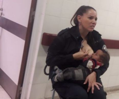 Fotografia momentului: O POLIŢISTĂ ALĂPTEAZĂ fiul SUBNUTRIT al unei femei ARESTATE. Gest de iubire SPONTAT cum rar s-a mai văzut