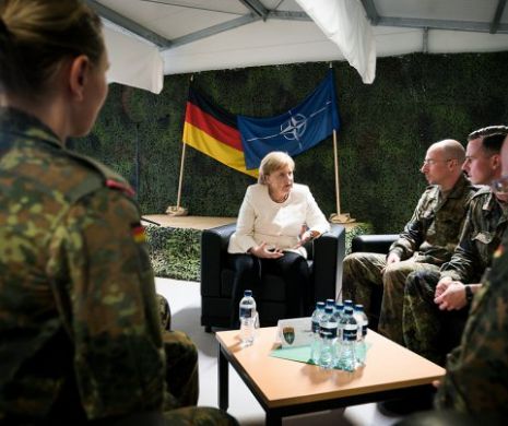 Berlinul acuză Moscova de destabilizarea statelor ex-sovietice. Merkel: Militarii germani, vizaţi de un război hibrid