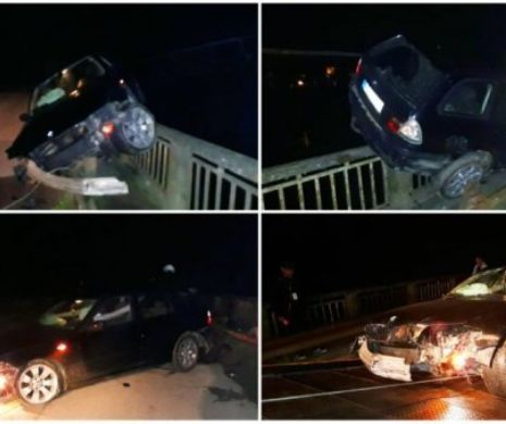 Ca-n filme! Un BMW suspendat pe parapetul unui pod din Alba