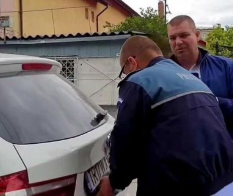 Ofițer de la Înmatriculări, prins cu numere ilegale la mașina de lux care nu este trecută în declarația de avere