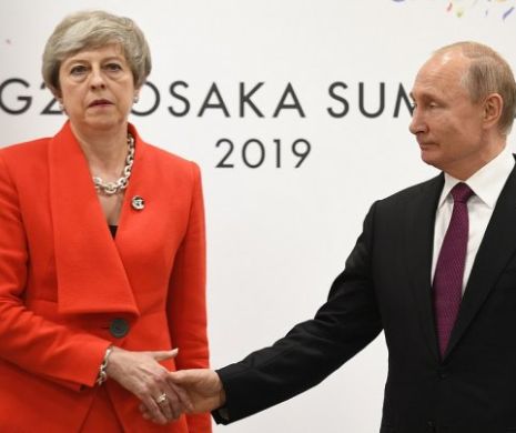 „Pentru Noviciok!”  - Theresa May l-a înghețat pe Putin. O poză care face cât o mie de cuvinte