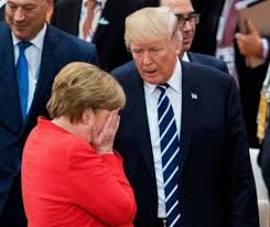 Merkel, gata să pună batista pe țambalul gâlcevilor UE cu lumea. Mai puțin cu Trump