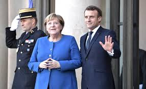 Merkel și Macron vor slăbirea controalelor la frontiere