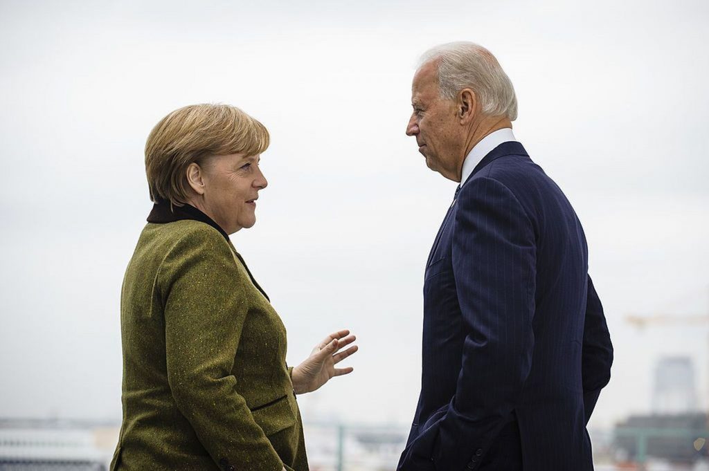 Umilința supremă pentru Biden. Merkel l-a dus de nas
