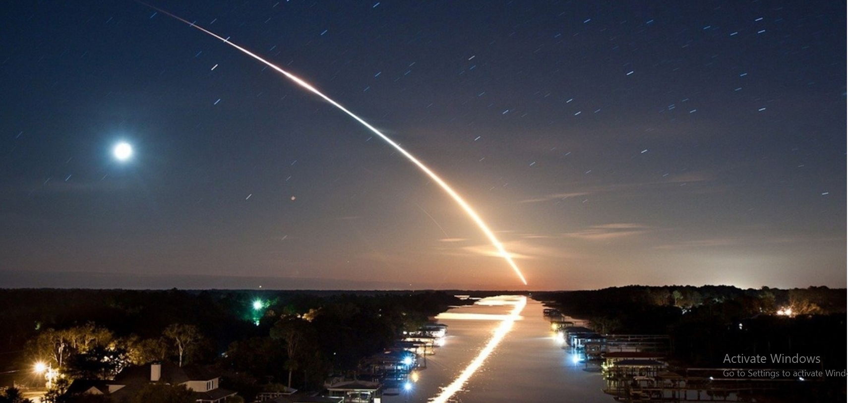 Needle hits earth at speed of light