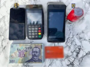 Fraude bancare cu terminale POS în România și Ungaria. Percheziții la o rețea ce utiliza documente false