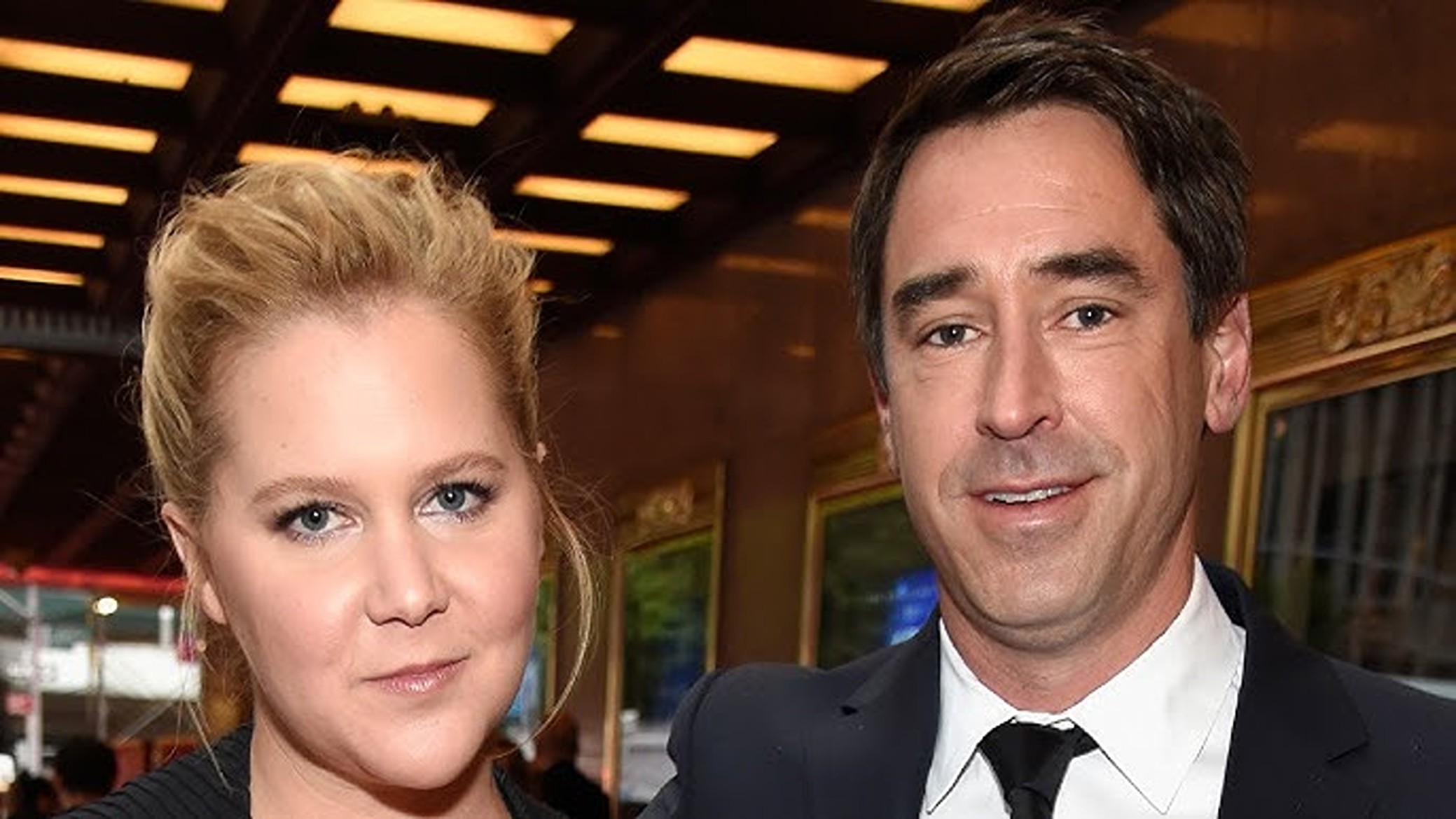 Amy Scumer și Chris Fischer.